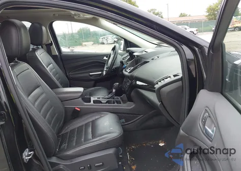 2017 Ford Escape Titanium z USA, uszkodzony, nr VIN 1FMCU9JD1HUC06323